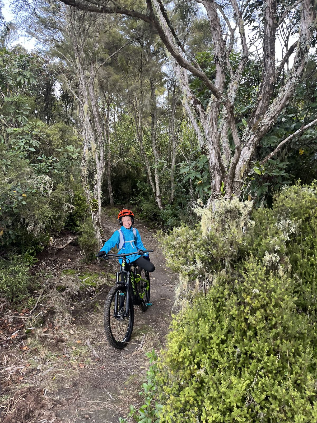 A child riding the Great Lake Trail