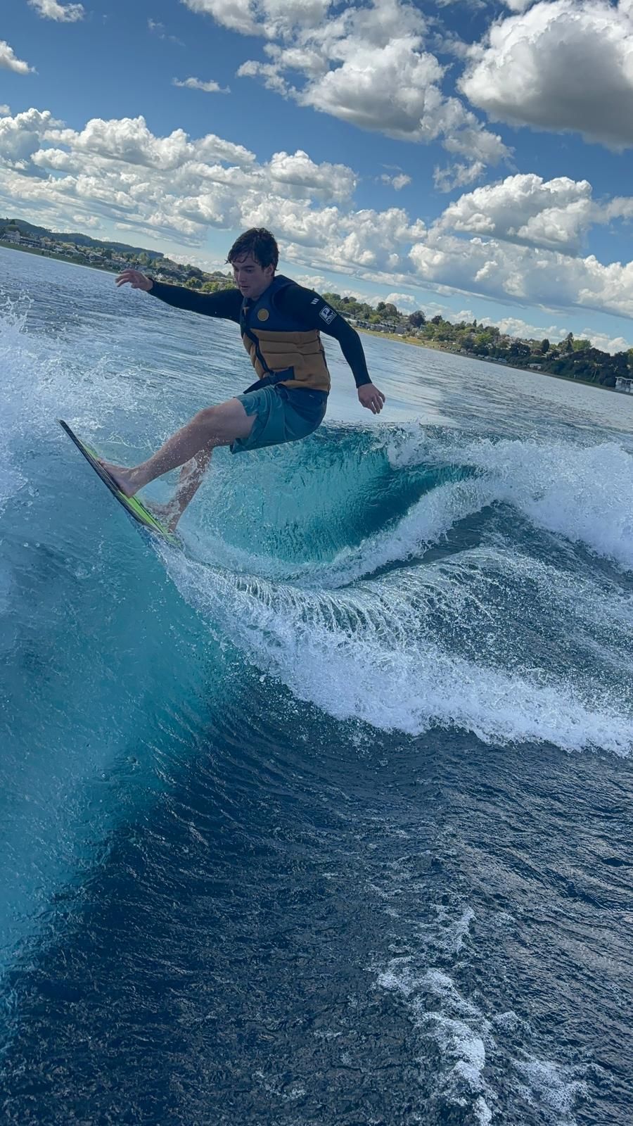 Wake surfing behind a boat on Lake Taupō